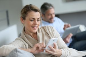 woman checking email on phone