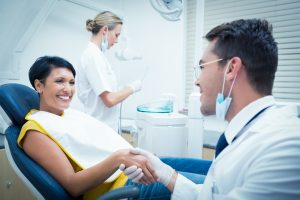 dentist meeting patient in person