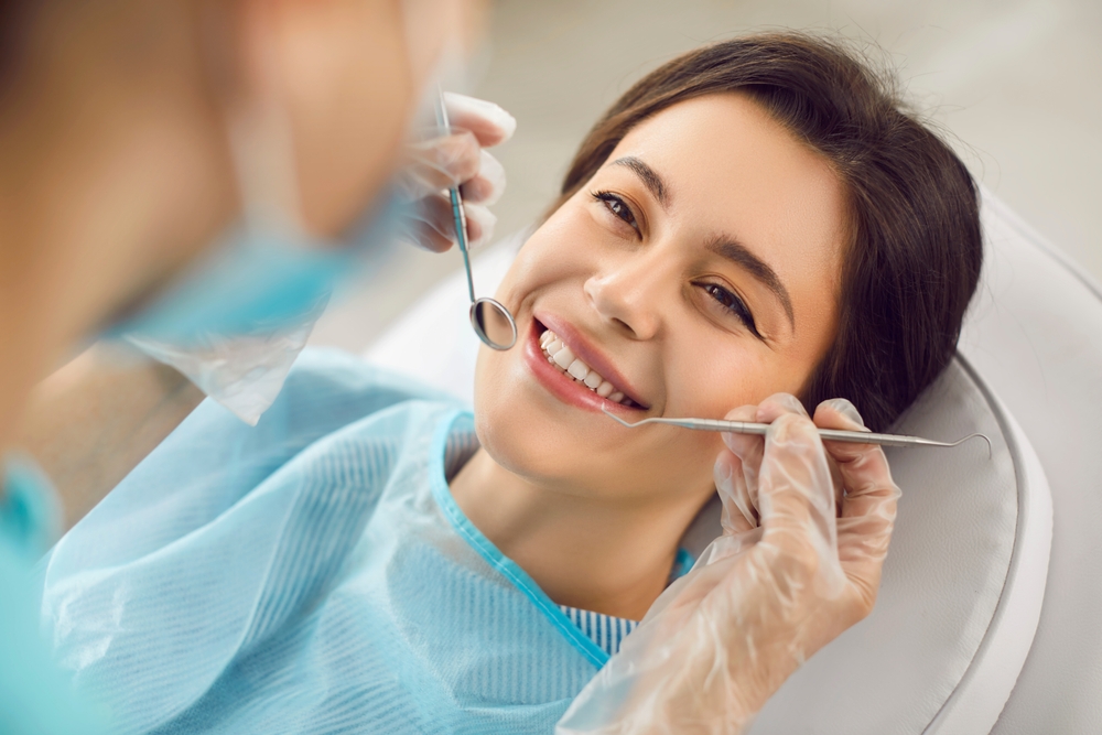 woman smiling at the dentist